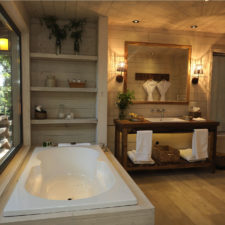 View of the cabin bathroom. Spacious and rustic with great attention to detail. Tub overlooking the terrace.
