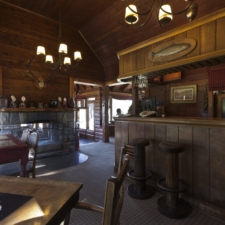 Cozy cabin-style restaurant bar. Beautiful native woods with wide spaces.