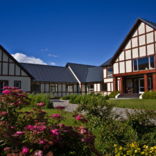 View from the gardens of the lodge. German style architecture with woven woods.