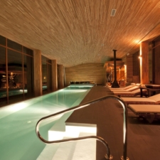 Inside view of the indoor pool. Wide and modern native wood architectural lines. A warm and comfortable space.